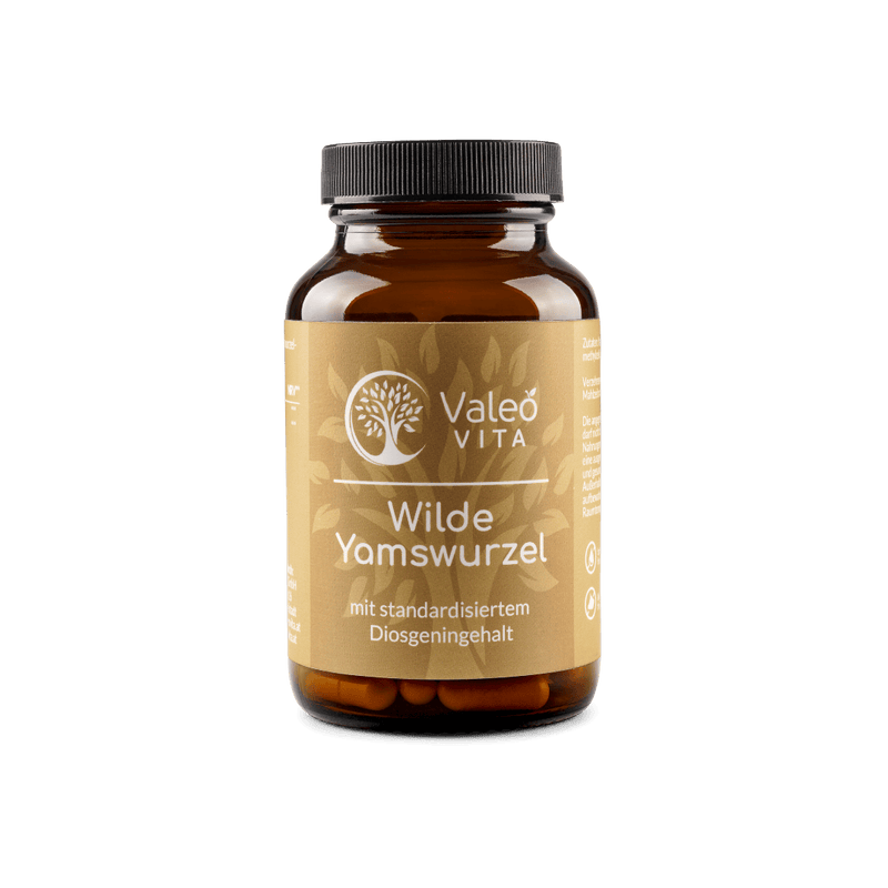 Braunglasdose Valeo Vita Wilde Yamswurzel Kapseln mit standardisiertem Diosgeningehalt auf schwarzem Hintergrund