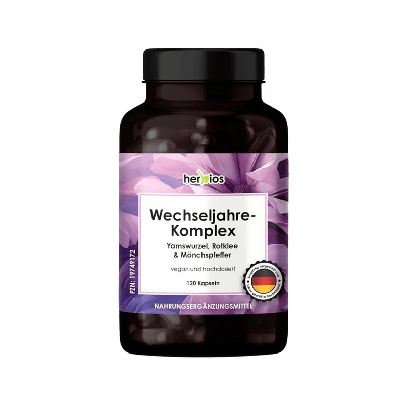 Herbios Wechseljahre-Komplex Nahrungsergänzungsmittel in dunkler Glasflasche mit violettem Etikett vor schwarzem Hintergrund