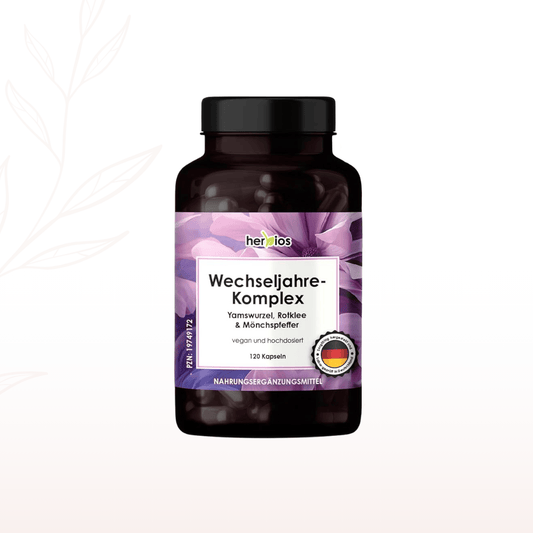 Herbios Wechseljahre-Komplex Nahrungsergänzungsmittel in dunkler Glasflasche mit violettem Etikett
